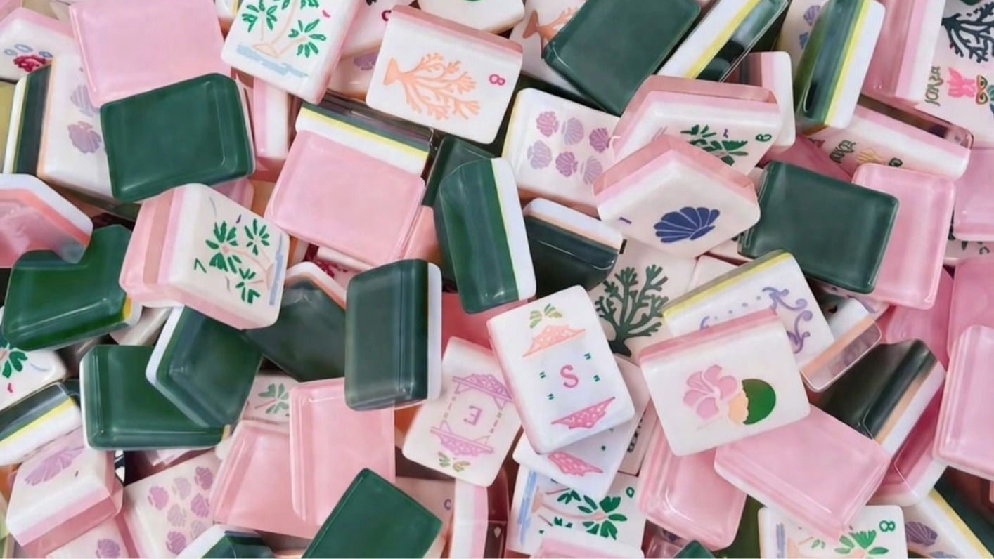 The Mahjong Club in Brentwood, TN, pink and green mahjong tiles for playing or learning a game of mahjong.