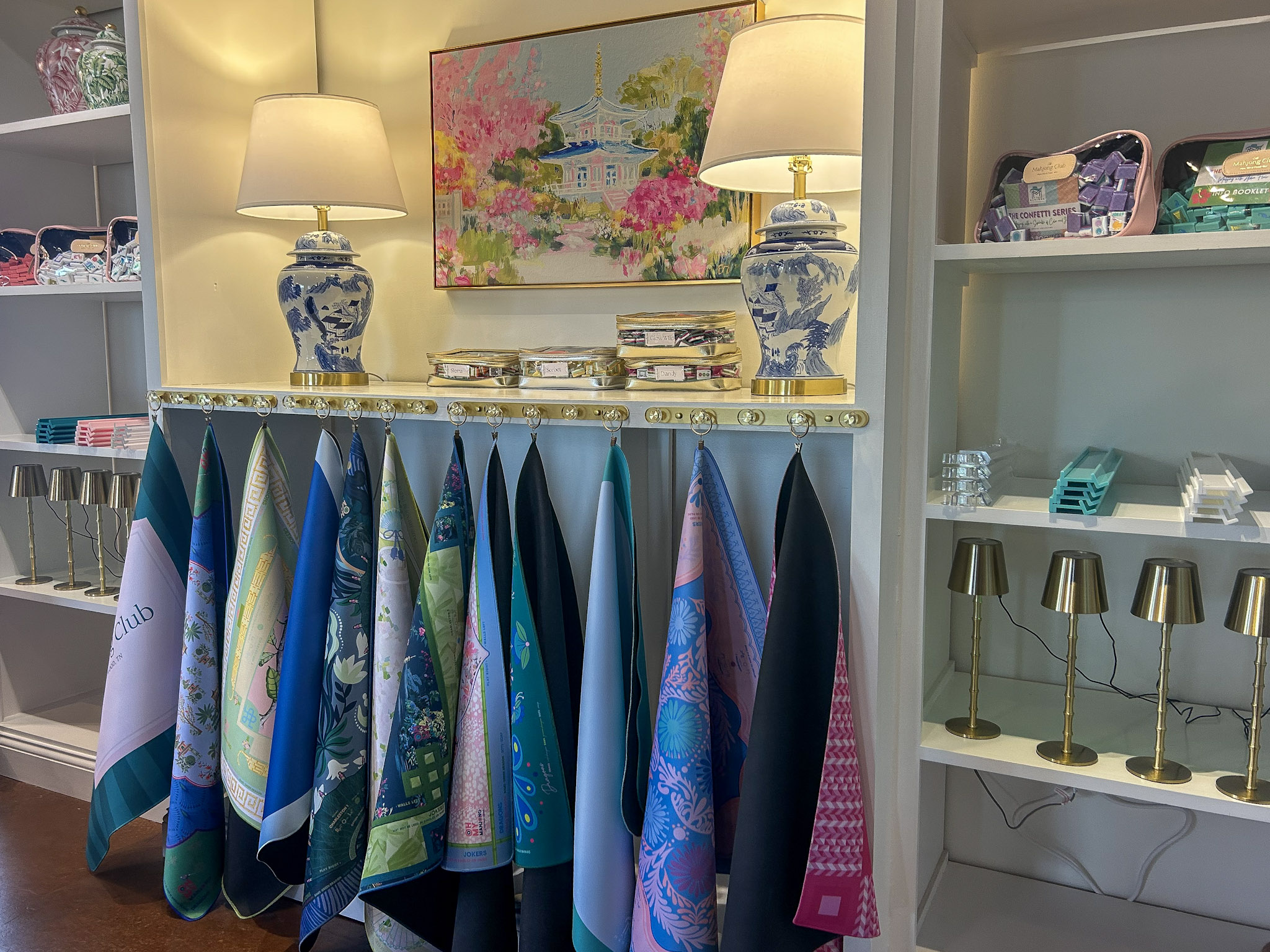 The Mahjong Club in Brentwood, TN, retail shelves with mahjong accessories, mats, and gifts.