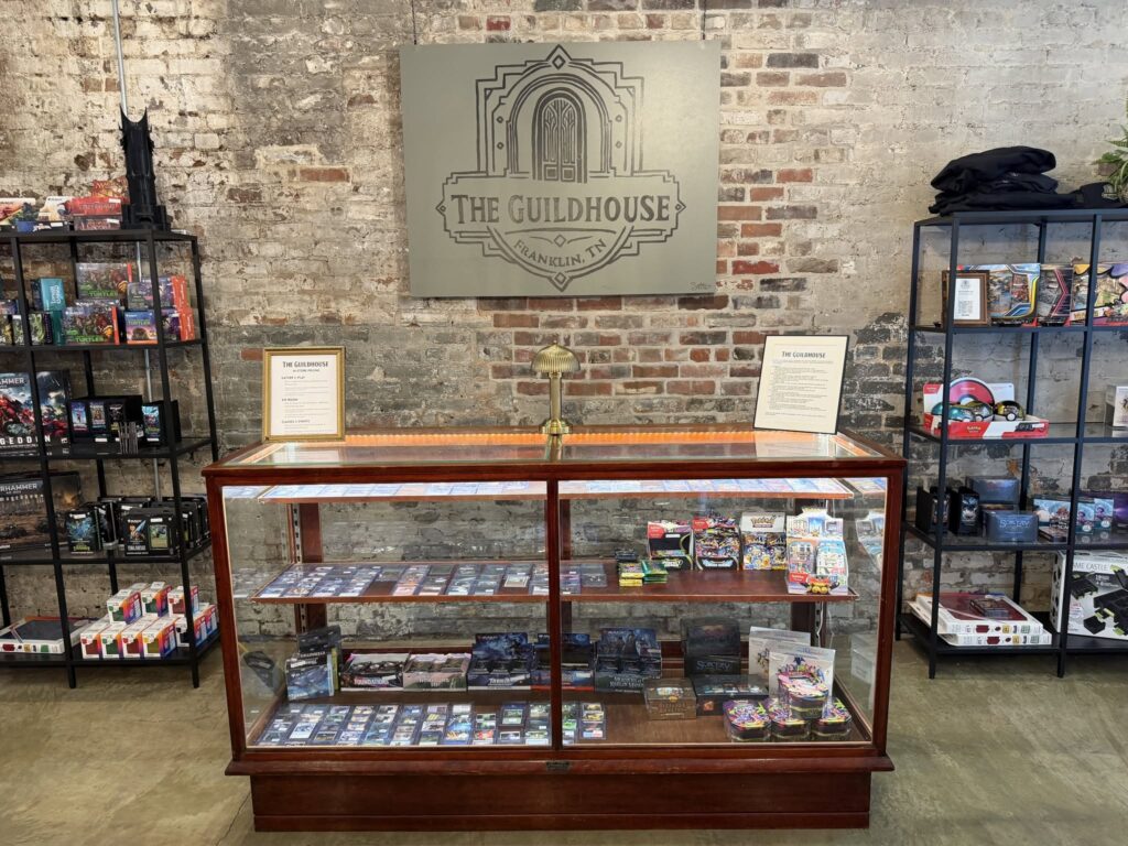 The Guildhouse tabletop gaming shop in downtown Franklin, TN, featuring board games, collectible card games, and gaming merchandise.
