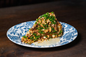 Chef Benjamin Tyson of Butterlamp Bread and Beverage | Nashville Roasted Cabbage, Horseradish Juice, Smoked Shallots, Koji Beurre Blanc, Peanuts, Chives