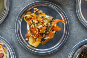 Chef Selim Ülker of Kardes Turkish Grill and Bar | Nashville, TN -Meyhane Experience: (1) Hummus, Sucuk, Tahini, Cumin, Parsley; (2) Zucchini-Carrot Siyirma, Black Currants, Pine Nuts, Dill; (3) Celeriac, Olive Oil, Oranges, Dill; (4) Pink Sultan, Peach Compote, Lemon, Walnuts; (5) Suzme Yogurt, Za’taar, Pomegranate Seeds; (6) Girit Ezme; (7) Kisir, Pickled Cucumber, Lettuce, Pomegranate Molasses, Mint, Dill, Scallion, Chives, Parsley; (8) Pita Bread