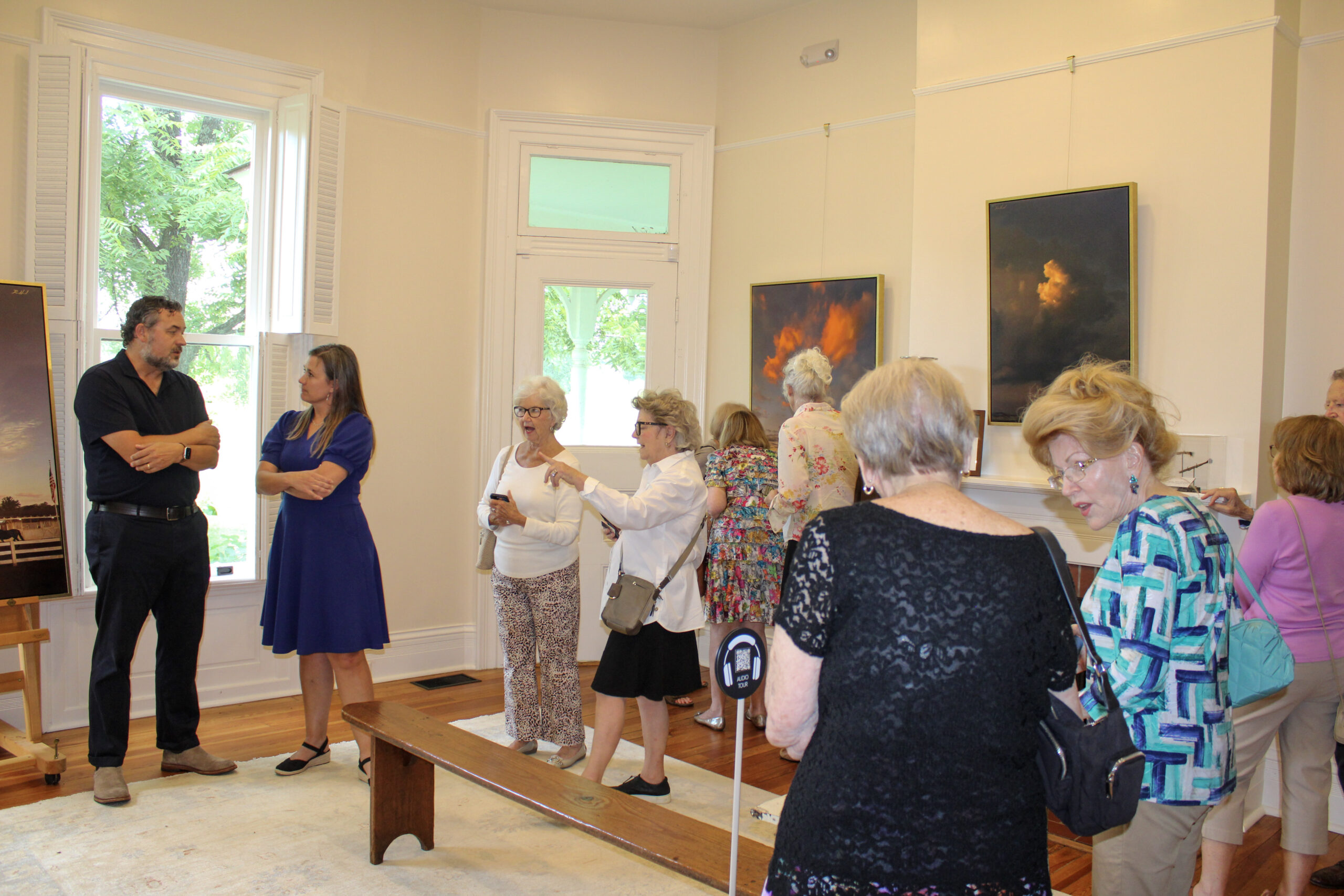 Guests view Dane Howard’s TN COWBOY exhibit inside Hayes House at Harlinsdale Farm in Franklin, Tennessee