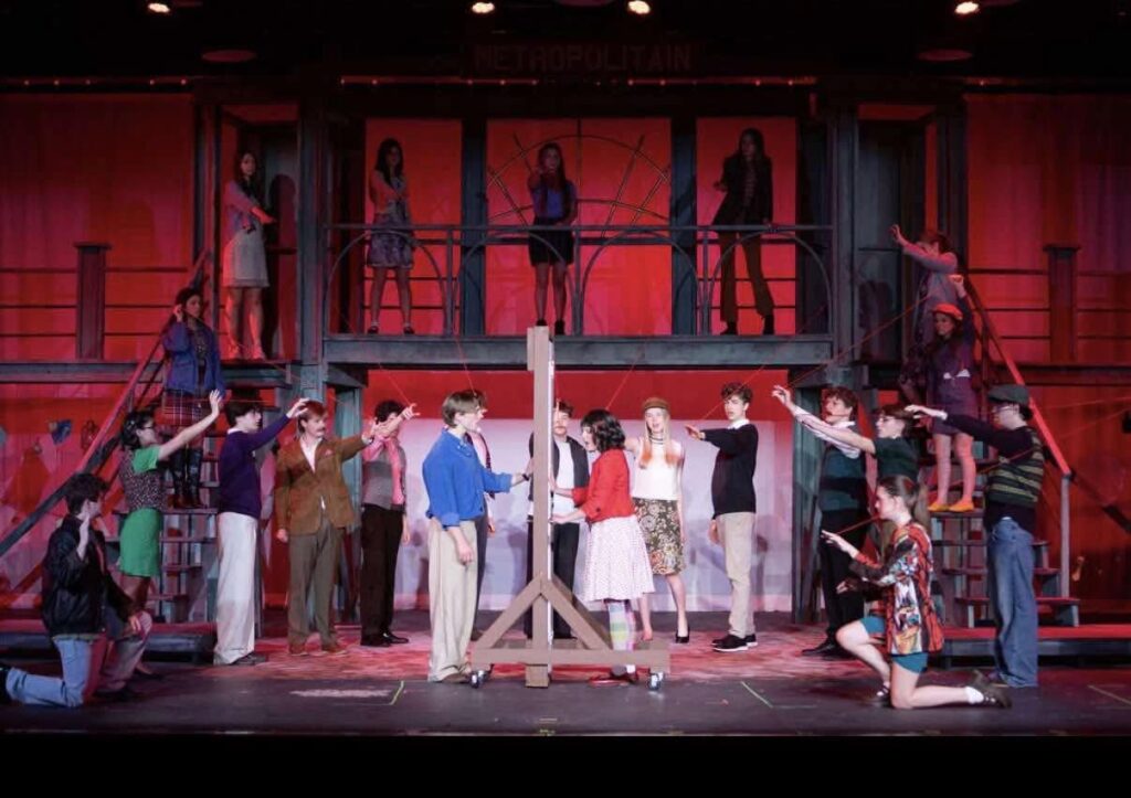 Students performing onstage at the Page High School Performing Arts Center in Franklin, Tennessee.
