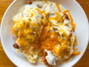 Cathead chicken biscuit with gravy and cheddar cheese at Big Bad Breakfast in Franklin, TN.