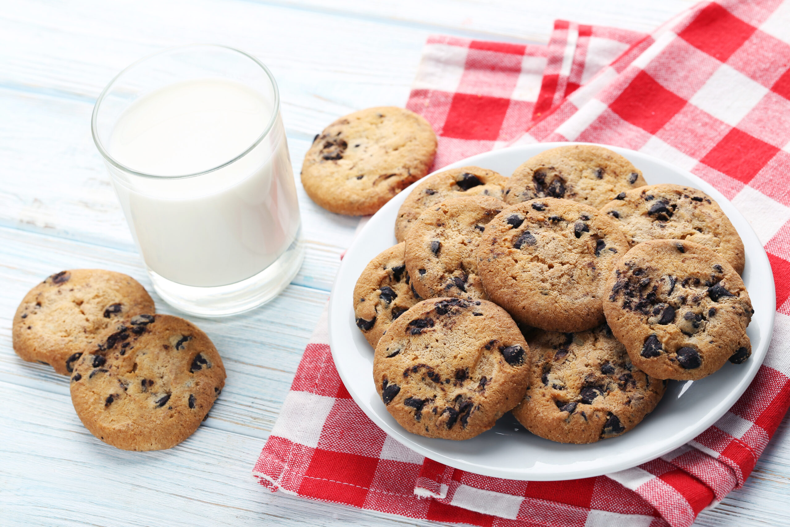Plate of chocolate chip cookies with a glass of milk for a downtown Franklin cookie walk.