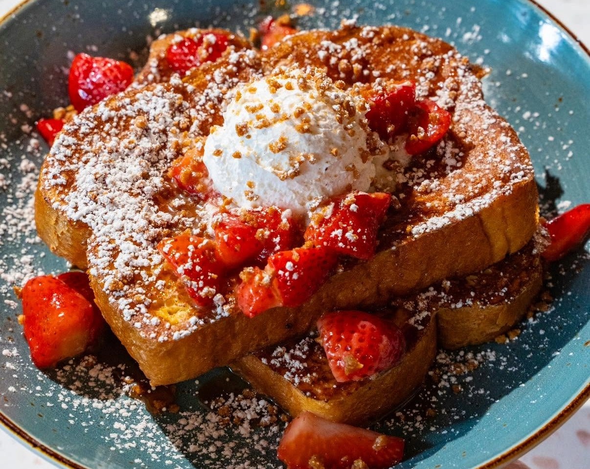 Strawberry tres leches French toast topped with whipped cream and strawberries at First Watch in Franklin, TN.