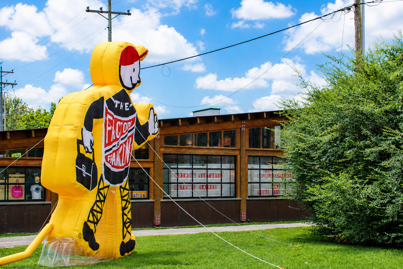 Frank inflatable figure outside Experimart in Building 10 at The Factory at Franklin
