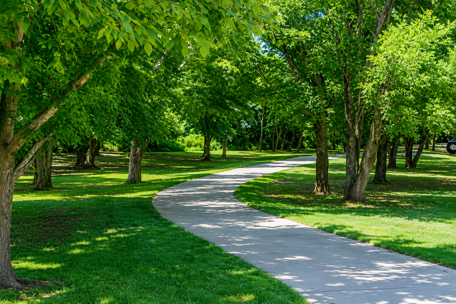 Shaded paved walking trail at Judge Fulton Greer Park in Franklin, Tennessee