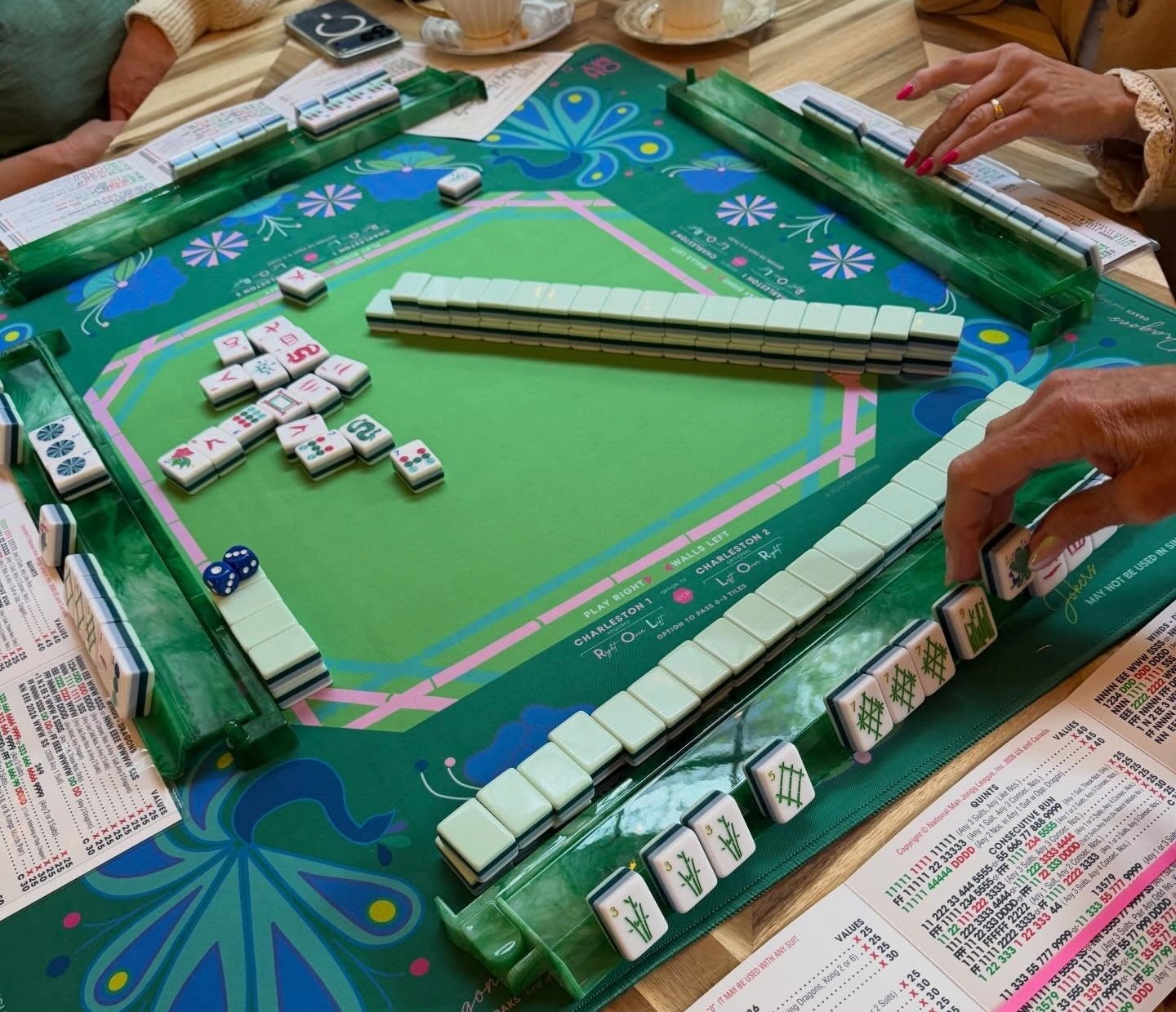 Players enjoying a game of American Mahjong at Fork of the South inside The Factory at Franklin.