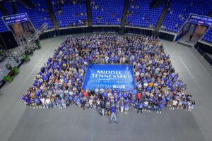 Large group of Middle Tennessee State University students gathered inside an arena in Murfreesboro, Tennessee.