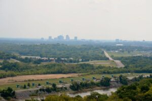 Nashville Gun Club grounds along the Cumberland River with the Nashville skyline visible in the distance.