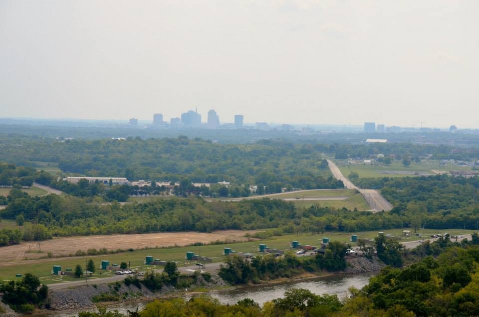 Nashville Gun Club grounds along the Cumberland River with the Nashville skyline visible in the distance.