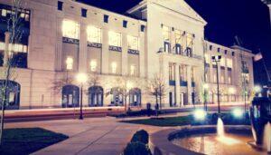 Nashville Public Library Main Library illuminated at night in downtown Nashville, Tennessee.