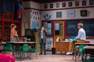 Actors performing on a classroom-style stage set during a Nashville Repertory Theatre production in Nashville, Tennessee.