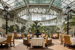 Dining room at Old Hickory Steakhouse inside Gaylord Opryland Resort in Nashville, Tennessee, overlooking the resort’s indoor gardens.