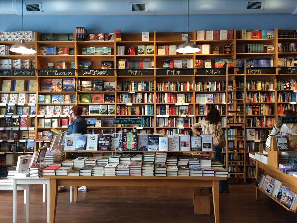 Interior of Parnassus Books in Nashville, Tennessee, with shelves of books and display tables.