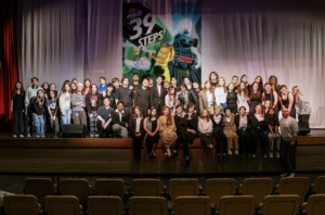 Students and performers gathered onstage at the Ravenwood Performing Arts Center in Brentwood, Tennessee.