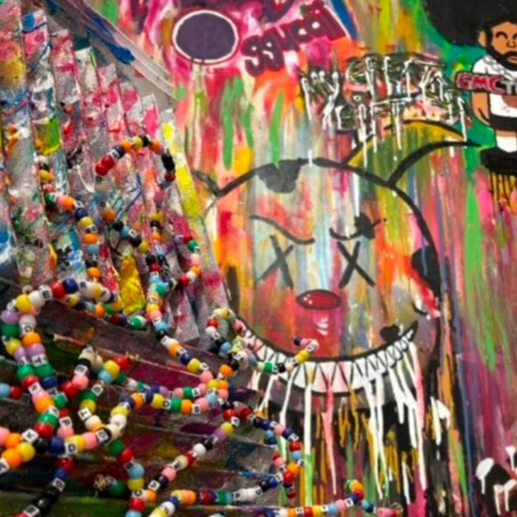 Colorful contemporary artwork on display at SUGallery in Nashville, featuring mixed-media details and bold painted imagery.