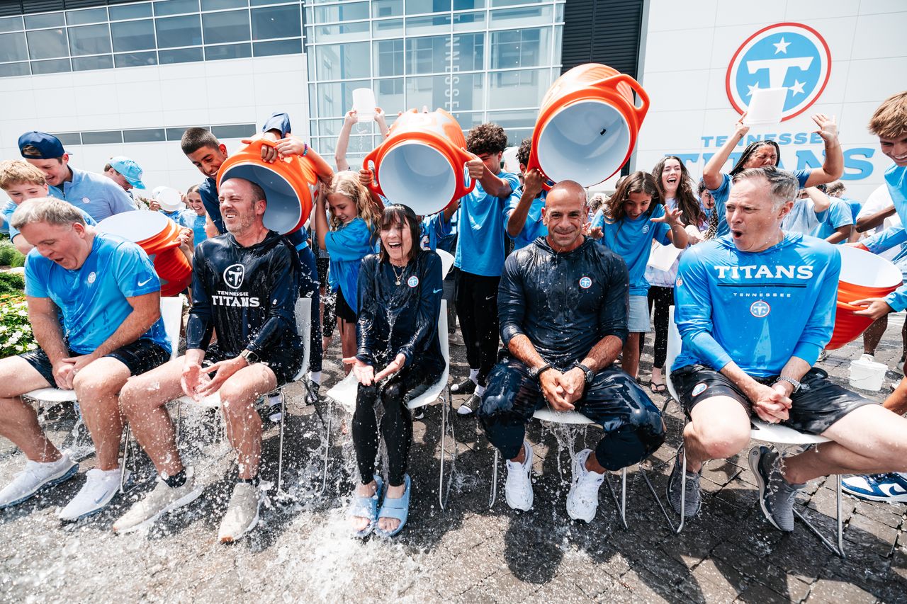 Tennessee Titans taking part in the ASL Ice Bucket Challenge in Nashville, Tennessee, supporting ALS awareness through a team charity event.