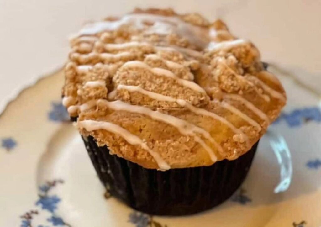 Giant muffin with crumb topping and icing drizzle from Triple Crown Bakery in Franklin, TN.