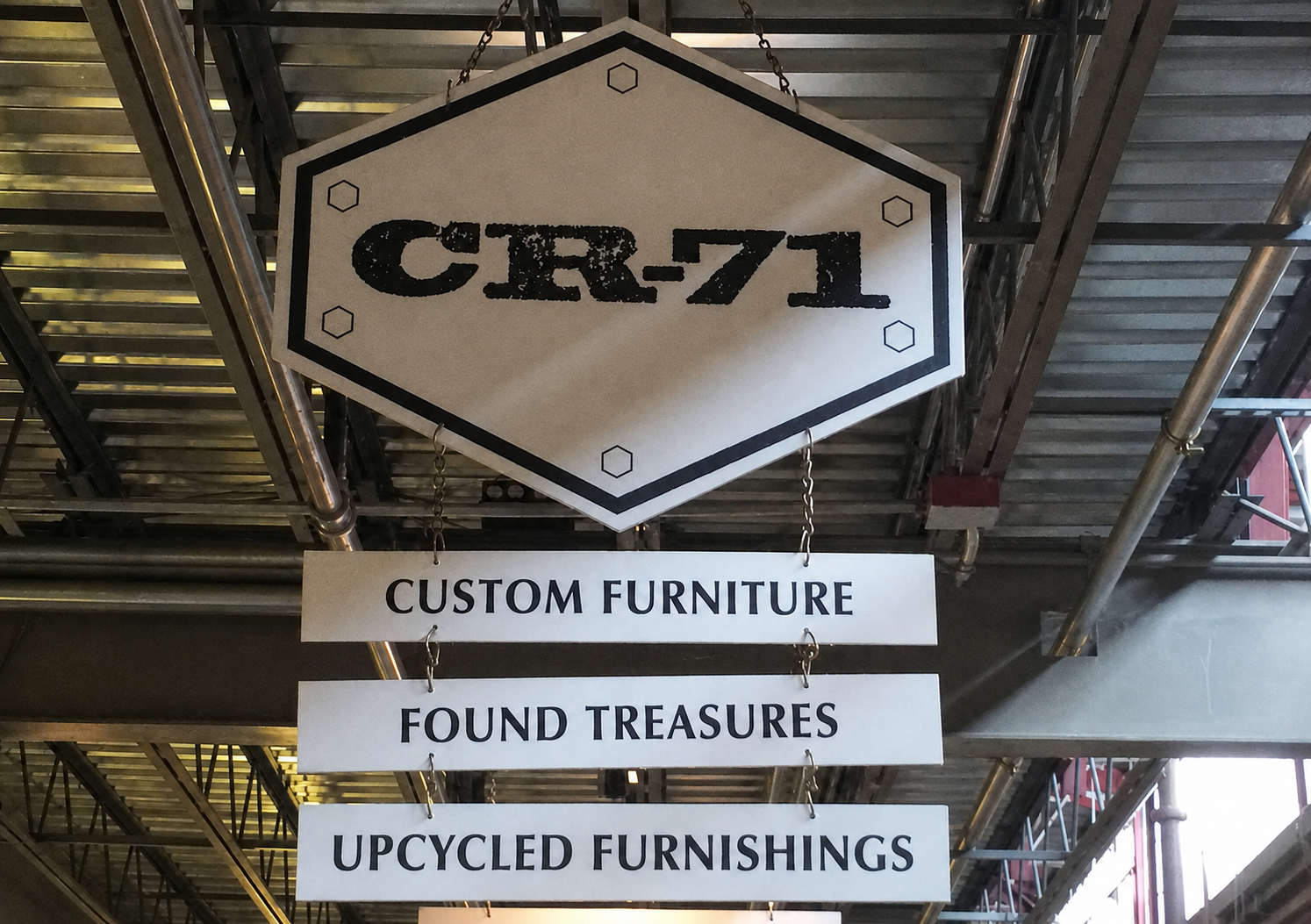 CR-71 store sign at The Factory at Franklin advertising custom furniture, found treasures and upcycled furnishings.