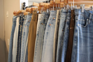 Emmeline boutique denim display featuring light-wash and dark-wash jeans on Main Street in Downtown Franklin, TN