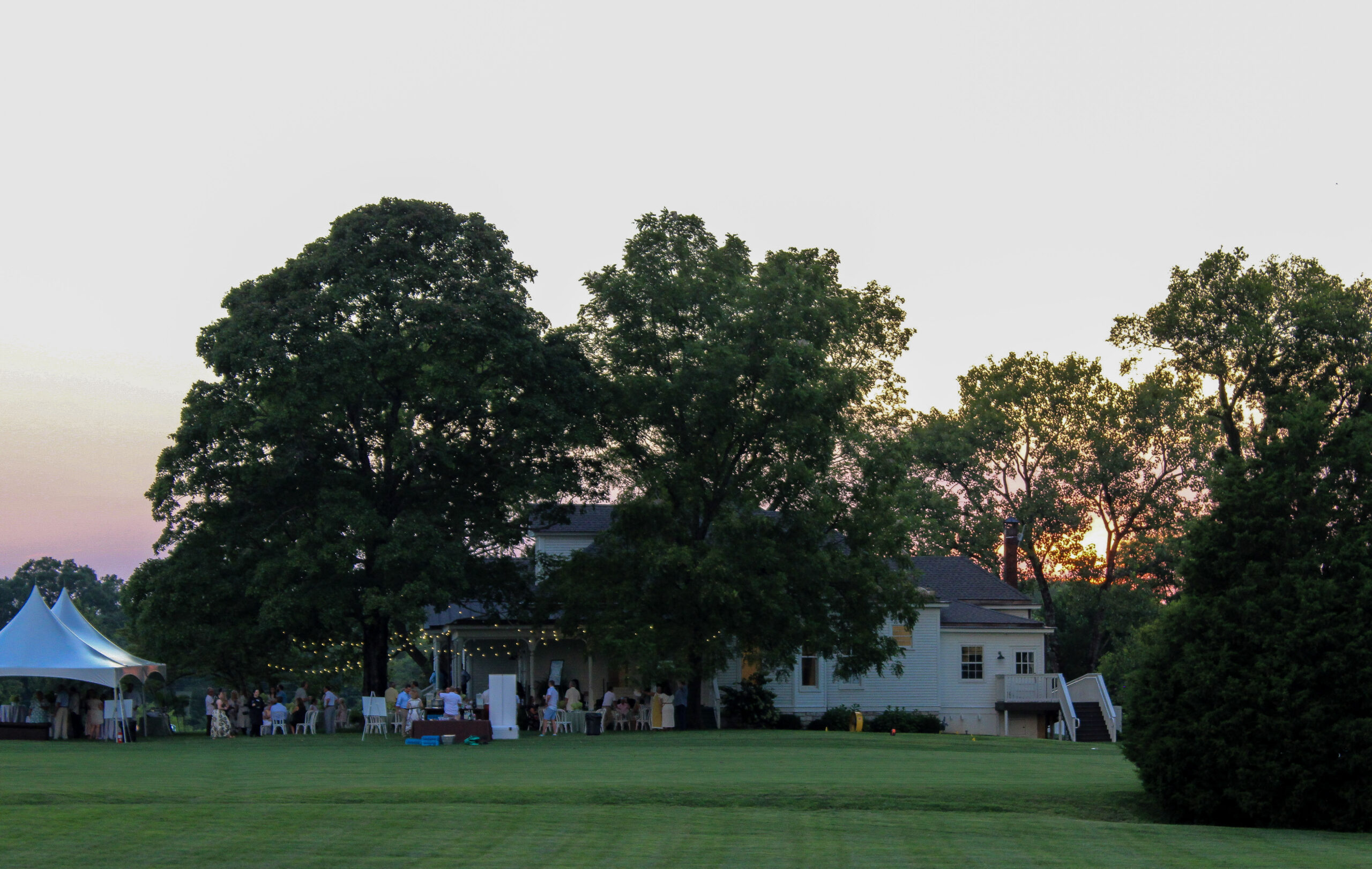 Hayes House and guests at sunset during the 2026 Raise the Roofs Sponsors Party in Franklin, Tennessee.