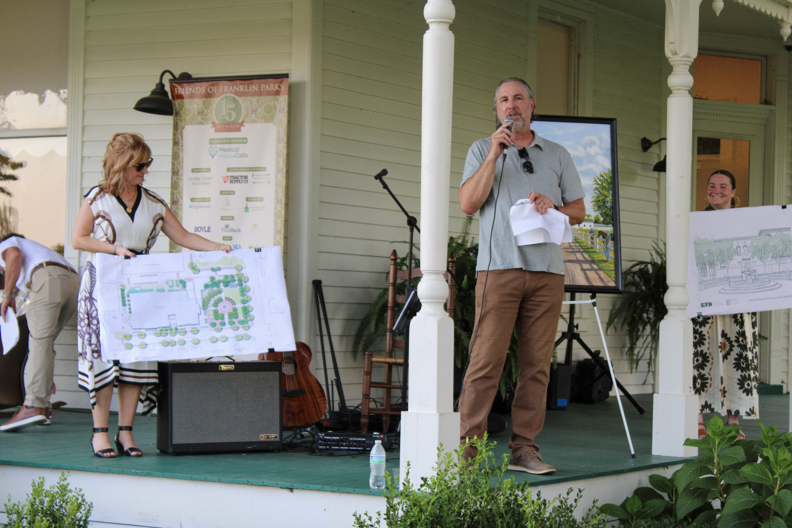 Torrey Barnhill, Gary Vogrin and Katie Murphy speak during the 2026 Raise the Roofs Sponsors Party at Hayes House in Franklin, Tennessee.