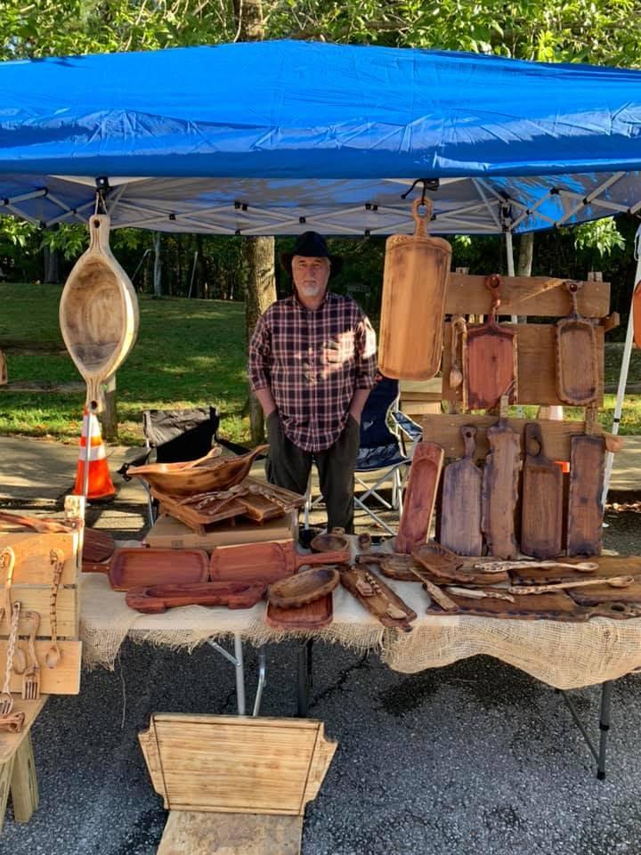 Woodworking vendor booth at the Arts and Crafts Fair at Bowie Park