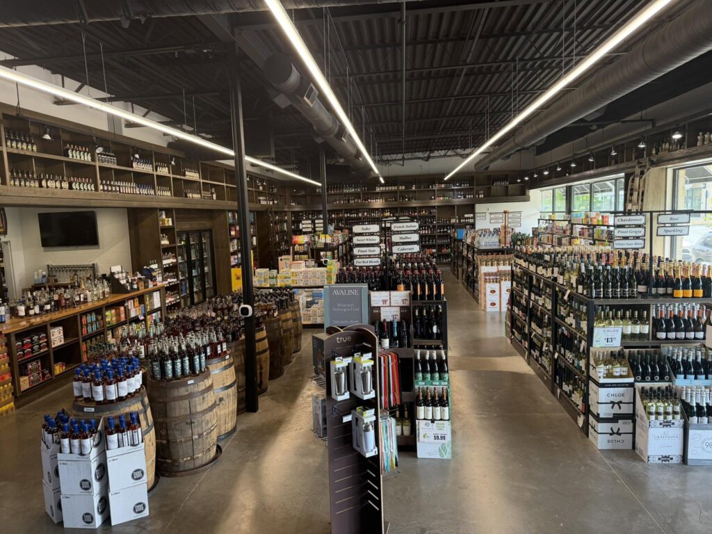 Interior of Barrels & Brews in Franklin, Tennessee, with shelves of wine, spirits, beer, and specialty bottles.