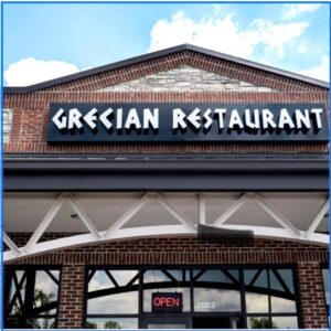 Exterior sign for Grecian Family Restaurant and Bakery in Spring Hill, Tennessee.