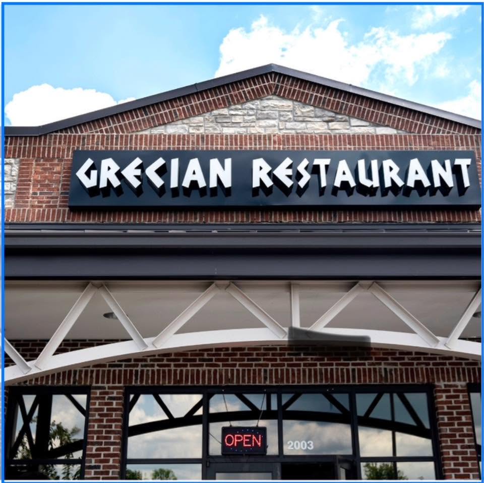 Exterior sign for Grecian Family Restaurant and Bakery in Spring Hill, Tennessee.