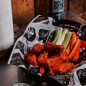 Buffalo-style chicken wings with celery and carrots at Outlanders Southern Chicken in Nolensville, Tennessee.