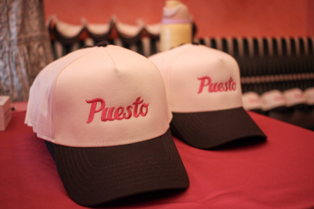 Custom hat featuring the Puesto logo at the Mexican restaurant in Nashville Yards, Nashville, TN.