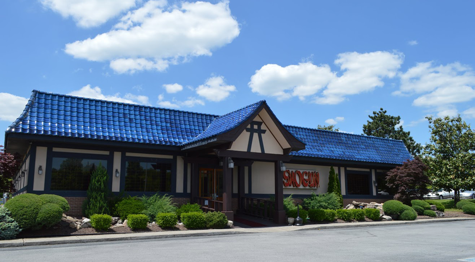 Exterior of Shogun Japanese Steakhouse in Brentwood, Tennessee, with its blue-tile roof and landscaped entrance.