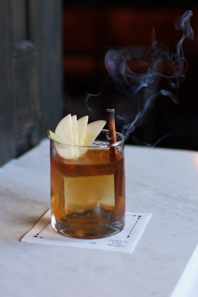 Stable Reserve Distillery downtown Franklin Tennessee Whiskey Trail Fireside TN, Bear Skin Rug drink - Holiday Experiences. Credit Tennessee Whiskey Trail.
