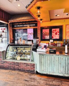 Interior counter at Sweet CeCe’s in Franklin, Tennessee, featuring ice cream, baked goods, and frozen dessert displays.