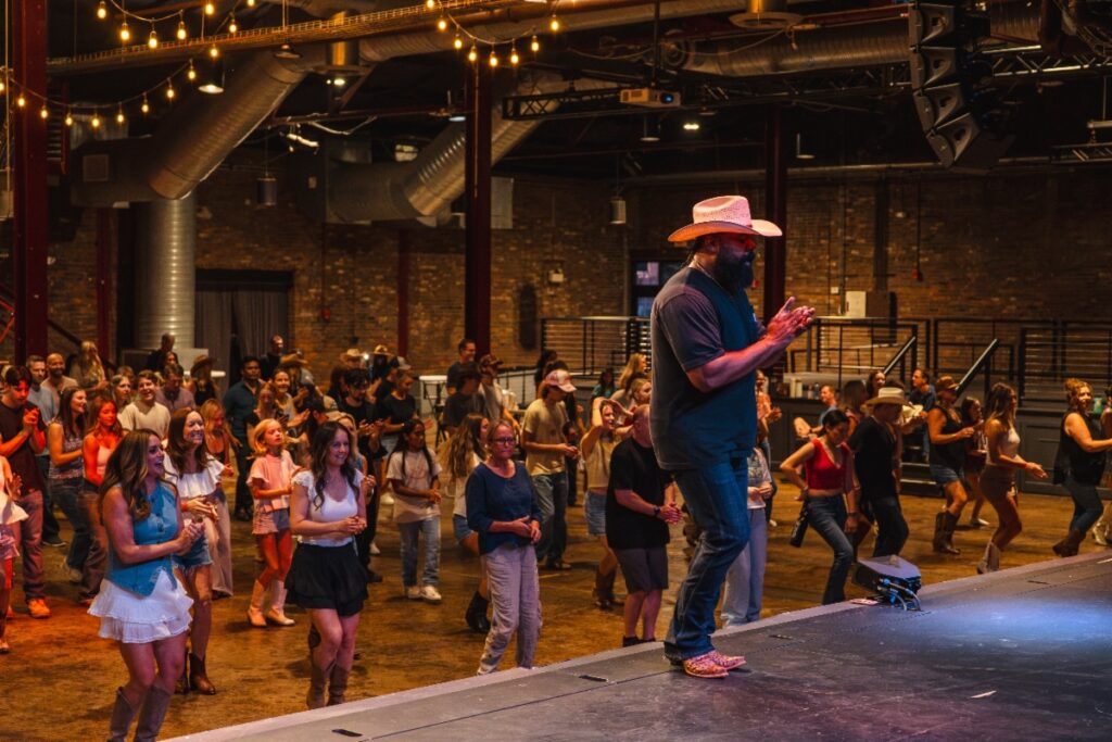 Line dancing at The Factory at Franklin in Liberty Hall.