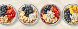 Colorful fruit and açaí bowls topped with blueberries, strawberries, bananas, mango, coconut, granola, and chia seeds from Tropical Smoothie Cafe in Franklin, Tennessee.
